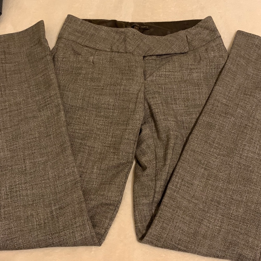 The Limited dress pants, size:4, missing a bottom in the back left pocket.
